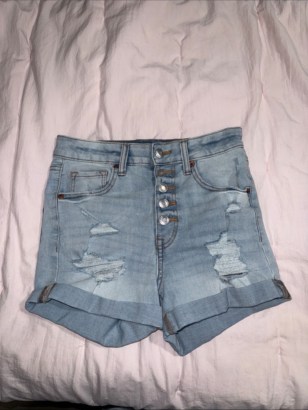 High-Rise Light Blue Distressed Jean Shorts with Rolled Hem